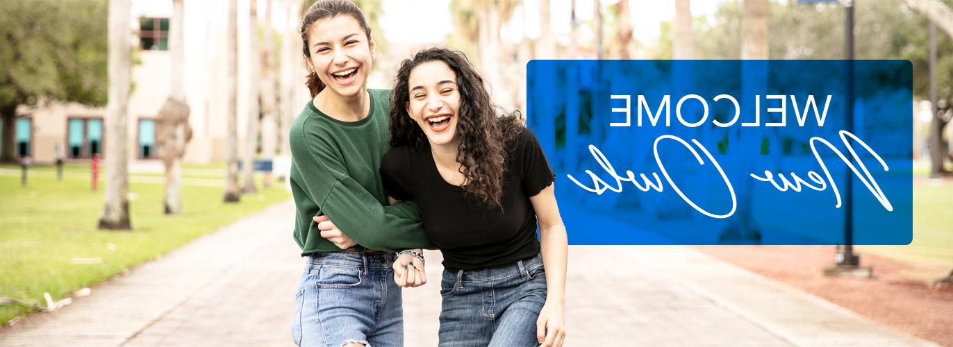 Two female students laughing